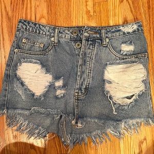 Denim skirt with rips